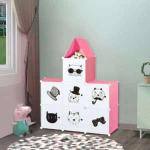 Armario organizador rosa con cubos decorados con gatos, ideal para ropa y juguetes.