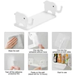 Estante blanco con diseño de elefantes para colgar en la pared, ideal para baño o cocina.