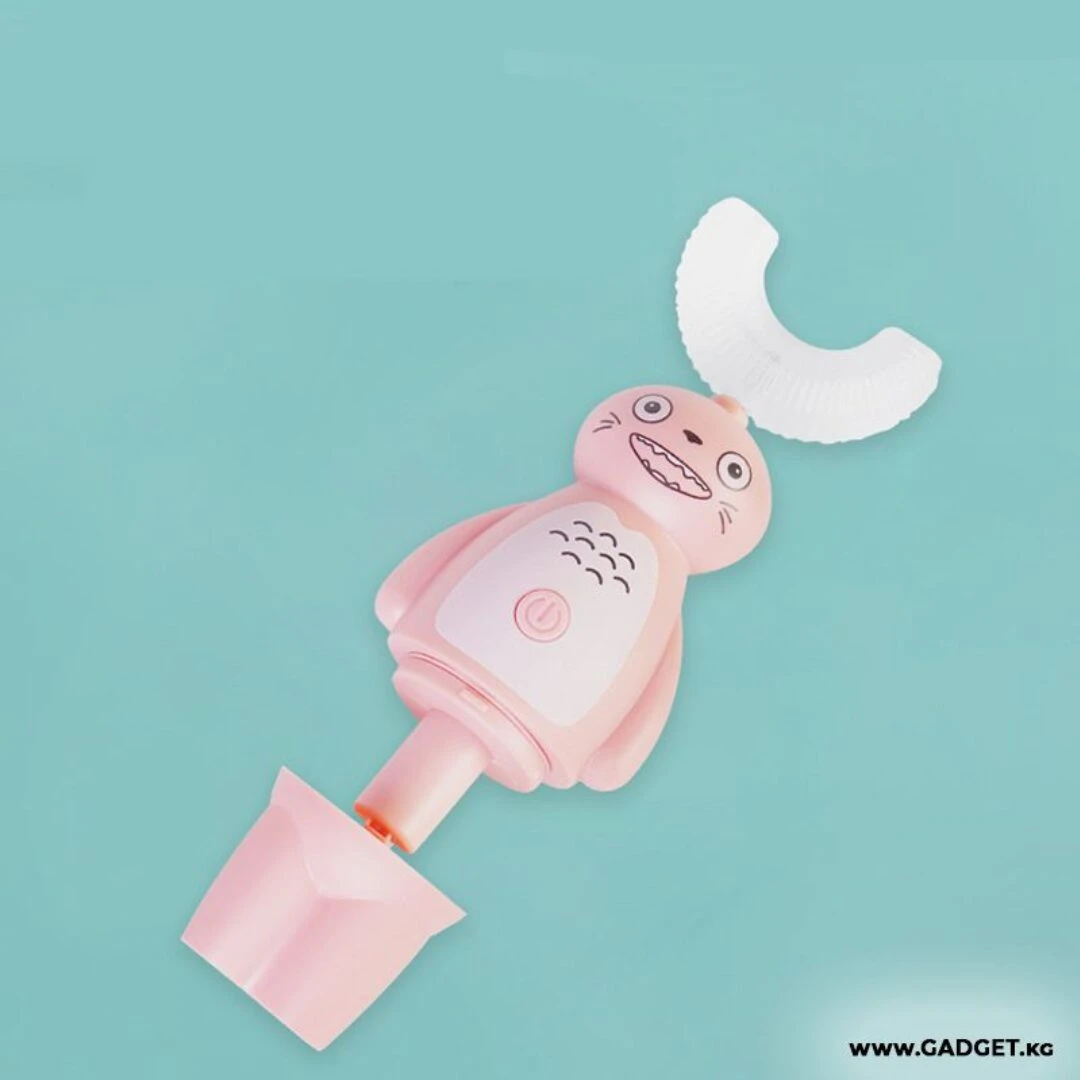 Cepillo dental eléctrico rosa para niños, forma de oso con cerdas en U blancas.