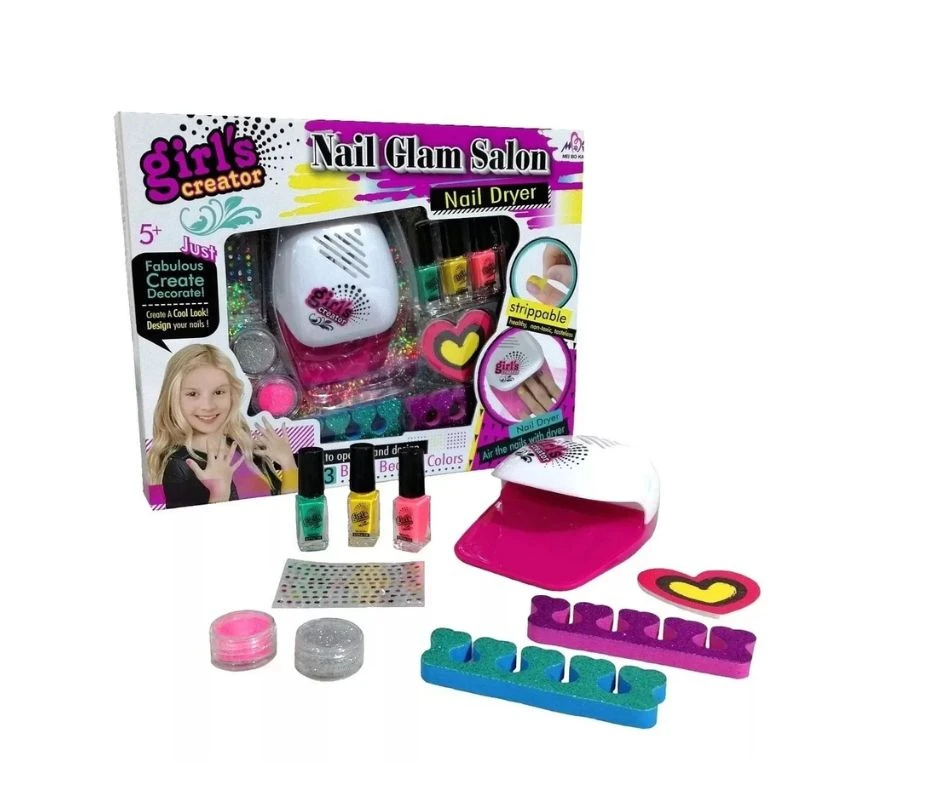 Set de manicura infantil Girl's Creator con secador rosa, tres esmaltes, purpurina, stickers y separadores de dedos, presentado en caja y piezas sueltas.