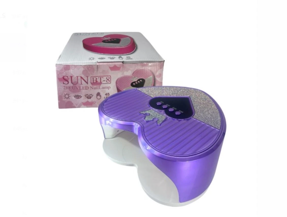 Lámpara UV LED profesional morada en forma de corazón con incrustaciones brillantes, botones de temporizador y su caja de empaque original de 288W.