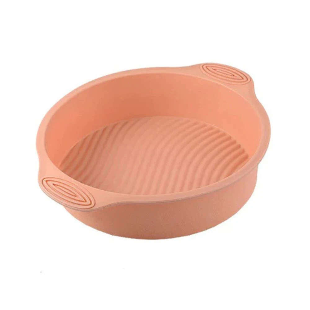 Molde de silicona rosado para freidora de aire, diseño texturizado y asas.