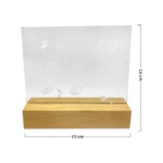 Pizarra acrílica borrable con diseño espacial sobre base de madera, mide 14x15 cm.