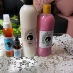 Kit capilar anticaída con tónico herbal, gotero, tratamiento y shampoo rosa, ideal para nutrir, reparar y dar brillo al cabello.
