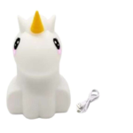Parlante unicornio de silicona blanca con cuerno amarillo y cable de carga USB incluido, diseño de luz nocturna infantil con acabado suave.