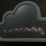 Lámpara blanca con forma de nube que proyecta un efecto de túnel infinito con luces LED internas dispuestas en fila sobre una base de cartón.