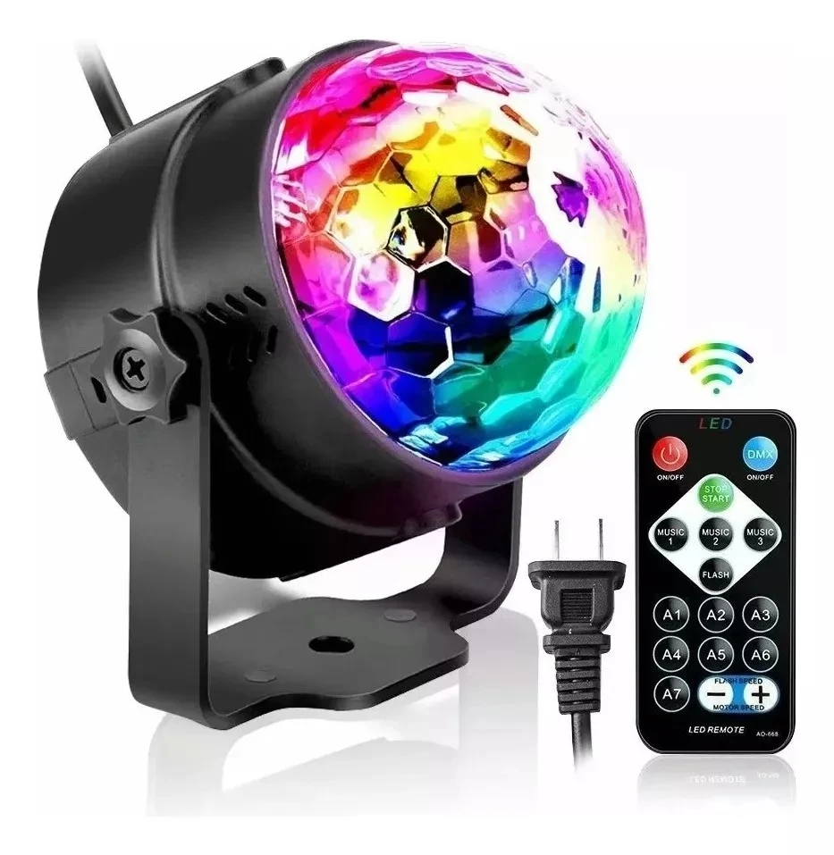 Lámpara de proyector con domo de cristal facetado multicolor, base giratoria negra y control remoto inalámbrico, diseñada para efectos de luces de fiesta.