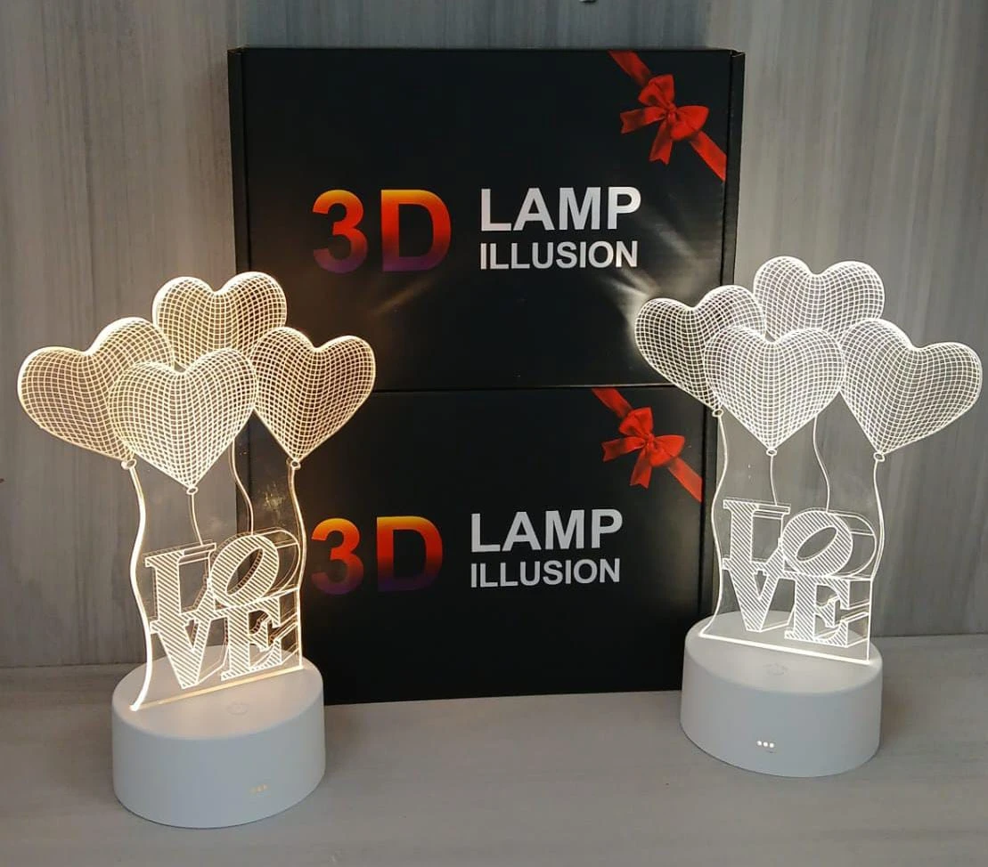 Lámpara decorativa 3D de corazones y palabra "LOVE" con base blanca, ideal para regalo.