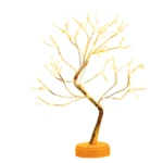 Árbol de luz LED dorado con base naranja, ideal para decoración.