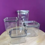 Juego de 4 organizadores de cocina transparentes cuadrados y rectangulares con tapa de clip.