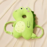Mochila Salvapasitos verde con forma de dinosaurio para bebé con diseño acolchado y tiras ajustables.