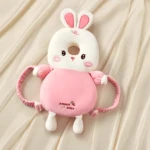 Mochila salvapasitos con diseño de conejo blanco y rosa para bebés, con correas ajustables.