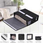 Caja organizadora de tela negra para ropa de cama con cremallera y ventana transparente.