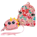Morral infantil rosado dinosaurios con parche frontal de dinosaurio rosa y tiras ajustables, conjunto escolar para niños.