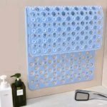 Alfombra de ducha antideslizante azul de PVC con textura de círculos, ideal para baño.