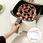 Set de dos parrillas redondas metálicas para brochetas en air fryer, con 8 brochetas incluidas.