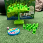 Juego de mesa de ranas verdes de equilibrio con dado y ruleta, para niños.