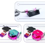 Torno profesional DM 202 para uñas, incluye pieza de mano, pedal, base y set de puntas intercambiables en colores verde azulado y fucsia metalizados.