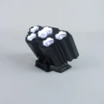 Linterna minera L-T21 negra con 6 luces LED blancas, montada sobre base ajustable, en fondo gris.