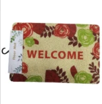 Tapete "Welcome" con flores rojas y verdes, de textura granular, ideal para entradas.