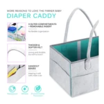 Cesta organizadora de pañales portátil de fieltro gris con compartimentos exteriores y asa, ideal para guardería.