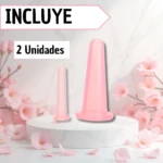 Ventosas de masaje facial rosadas, 2 unidades, para estirar la piel, sobre pedestal con flores.