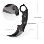 Cuchillo Karambit táctico negro con medidas detalladas en centímetros y pulgadas.