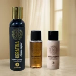 Set de Keratina Capricce negro con tapas doradas, shampoo y tratamiento intensivos en frascos pequeños.