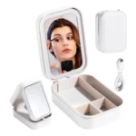 Organizador de maquillaje blanco con espejo LED, compartimentos y espejo pequeño plegable.