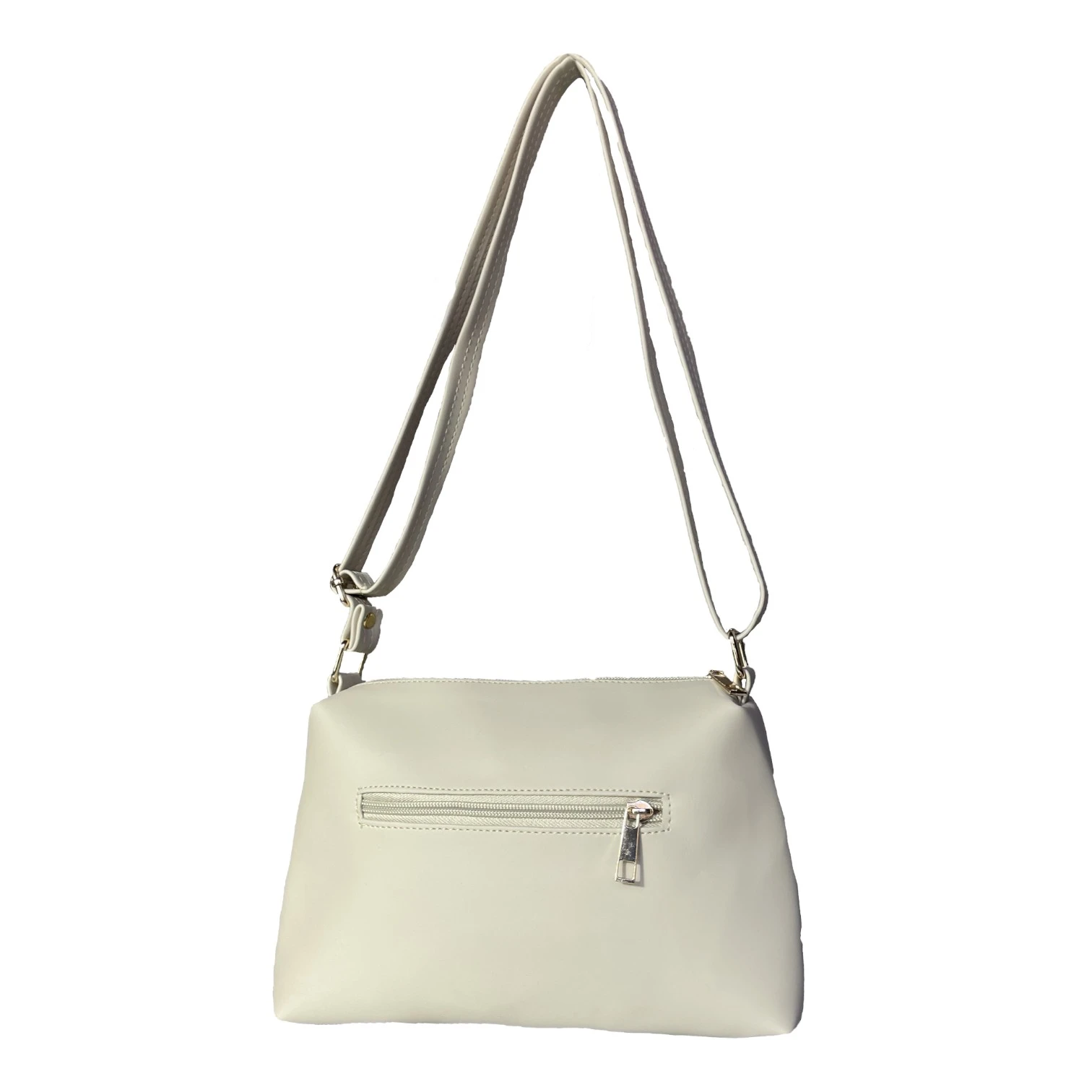 Bolso cruzado para dama color beige claro, vista trasera con bolsillo exterior con cremallera y herrajes dorados.