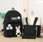 Set de 4 piezas: morral negro con parches y conejo peluche, bolso tote bicolor XIGUL, bandolera y estuche.