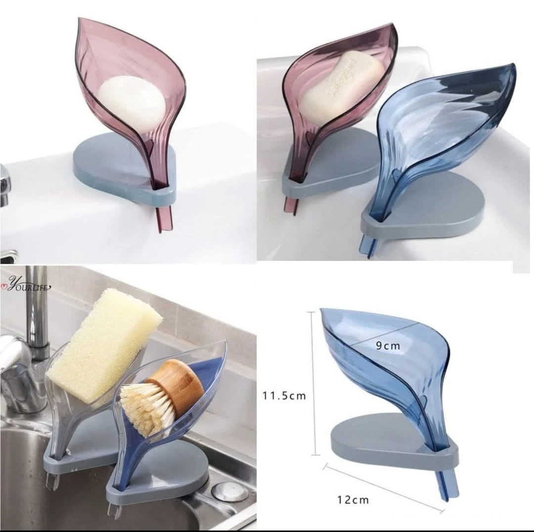 Jabonera en forma de hoja con drenaje, en tonos rosa y azul, ideal para baño y cocina.