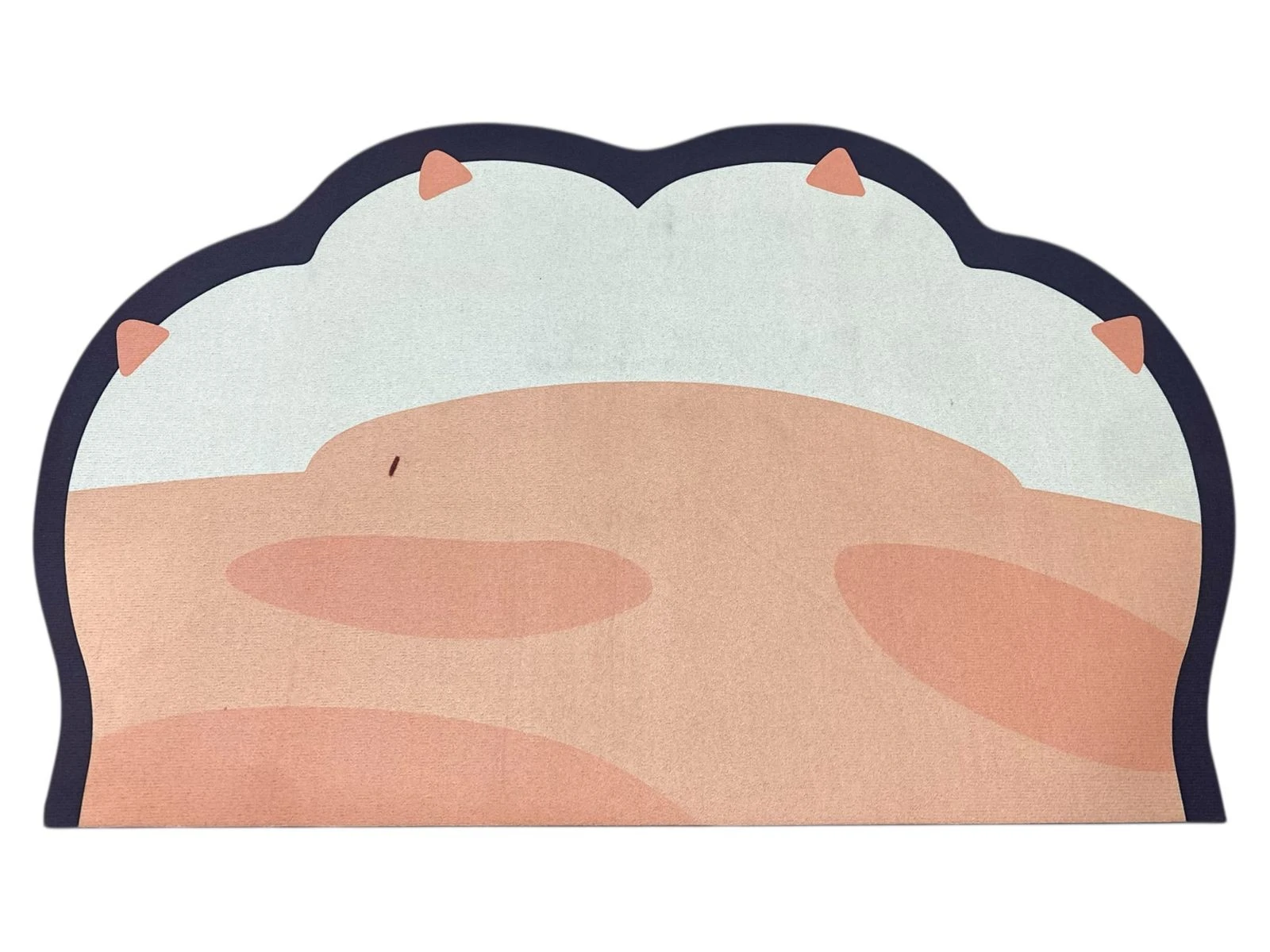 Tapete decorativo antideslizante con diseño de pata de animal color rosa y azul.