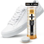 Pack de 10 esponjas limpiadoras de zapatos blancas para suelas, con zapatilla blanca al lado.