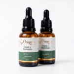Dos frascos ámbar con gotero negro de sérum para cejas y pestañas "Orígenes" 25ml con vitamina E.