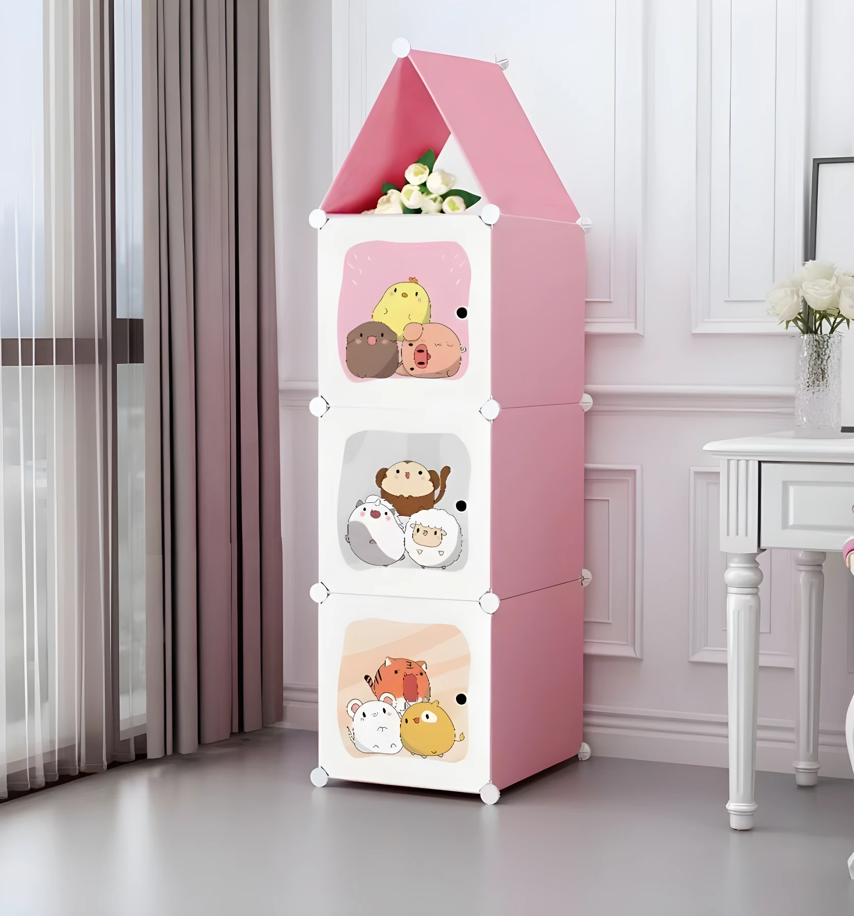 Armario rosa modular 3 cubos con animales caricaturizados, para ropa y juguetes infantiles.