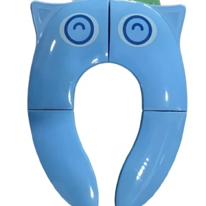 Asiento reductor de inodoro infantil azul claro plegable, con diseño de gato y ojos circulares.