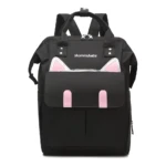 Mochila pañalera negra con orejas de gato rosadas y texto "Mommybaby", ideal para bebés.