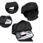 Bolso negro para dama, compartimento principal abierto, muestra celular, paraguas y tablet.