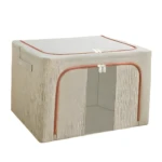 Cajón organizador rectangular de tela beige claro con textura, tapa y abertura frontal con cremallera color cobre.