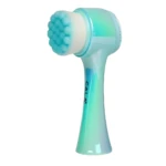 Cepillo de limpieza facial Cala doble cara con cerdas suaves y masajeador de silicona, mango iridiscente azul verdoso.
