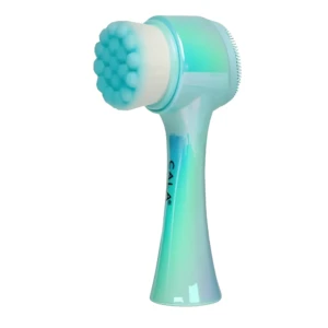 Cepillo de limpieza facial Cala doble cara con cerdas suaves y masajeador de silicona, mango iridiscente azul verdoso.