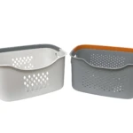 Cestas organizadoras blancas y grises, perforadas, para lavandería y juguetes.