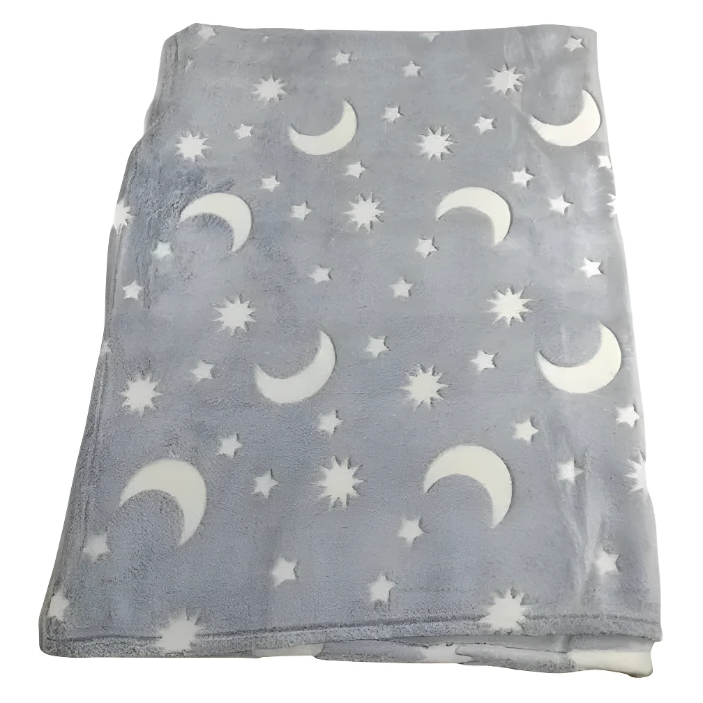 Cobija térmica gris con lunas y estrellas que brillan en la oscuridad, suave textura.