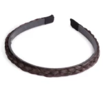Diadema café con trenza postiza, dientes interiores para mejor sujeción.