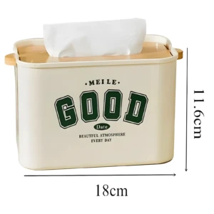 Dispensador de pañuelos color crema con tapa de madera, diseño "GOOD" y medidas 18x11.6cm.