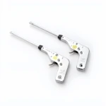 Dos encendedores de impacto metálicos cromados con caña larga, uno marcado "MADE IN JAPAN" y otro "MADE IN CHINA".