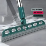 Escoba mágica de silicona verde, ideal para recoger agua y pelo de suelos, con diseño ajustable.