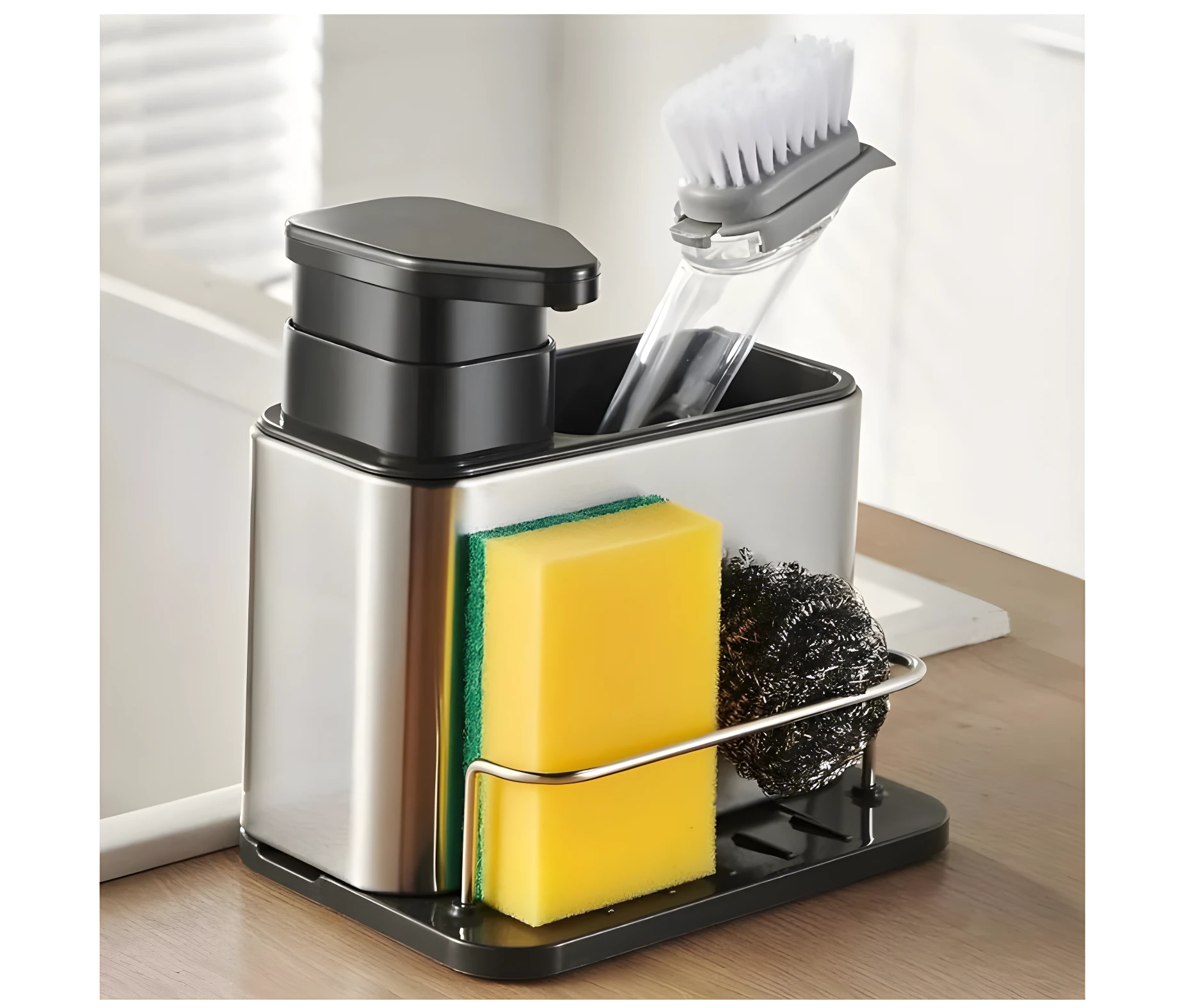Dispensador de jabón acero inoxidable con tapa negra, soporte para esponja amarilla y estropajo, junto a cepillo para platos.