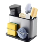 Dispensador de jabón líquido negro y organizador de acero inoxidable para cocina con dos esponjas, cepillo y estropajo azul.